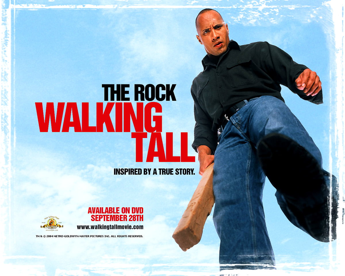 Dwayne Johnson met bordje (scène uit film "Walking Tall") / gratis achtergrond afbeelding 1280x1024