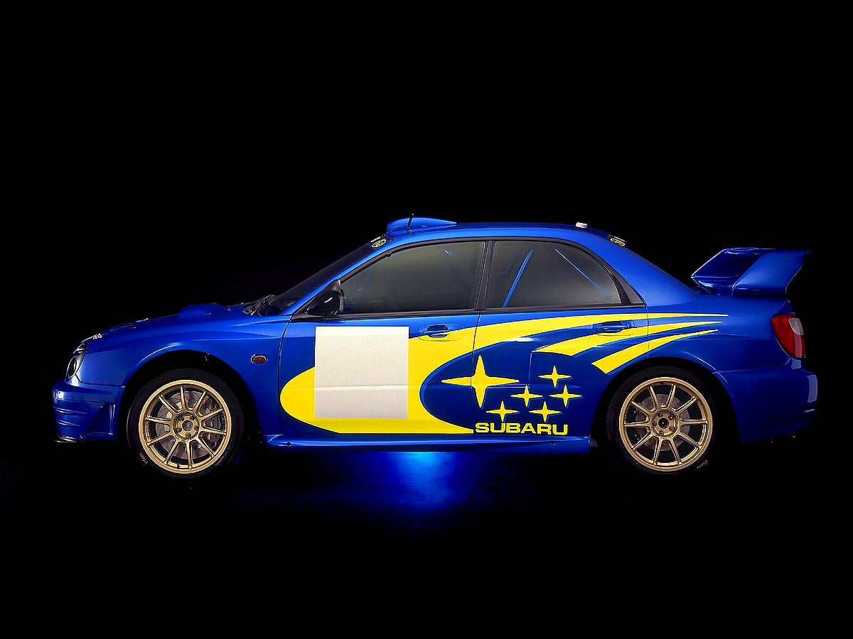 Kleine blauwe Subaru - gratis achtergrond 1600x1200